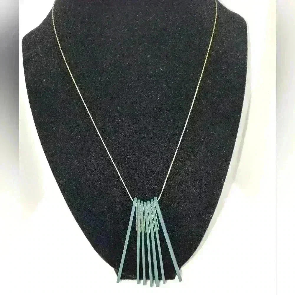 Plunder gold tone chain with wood charms